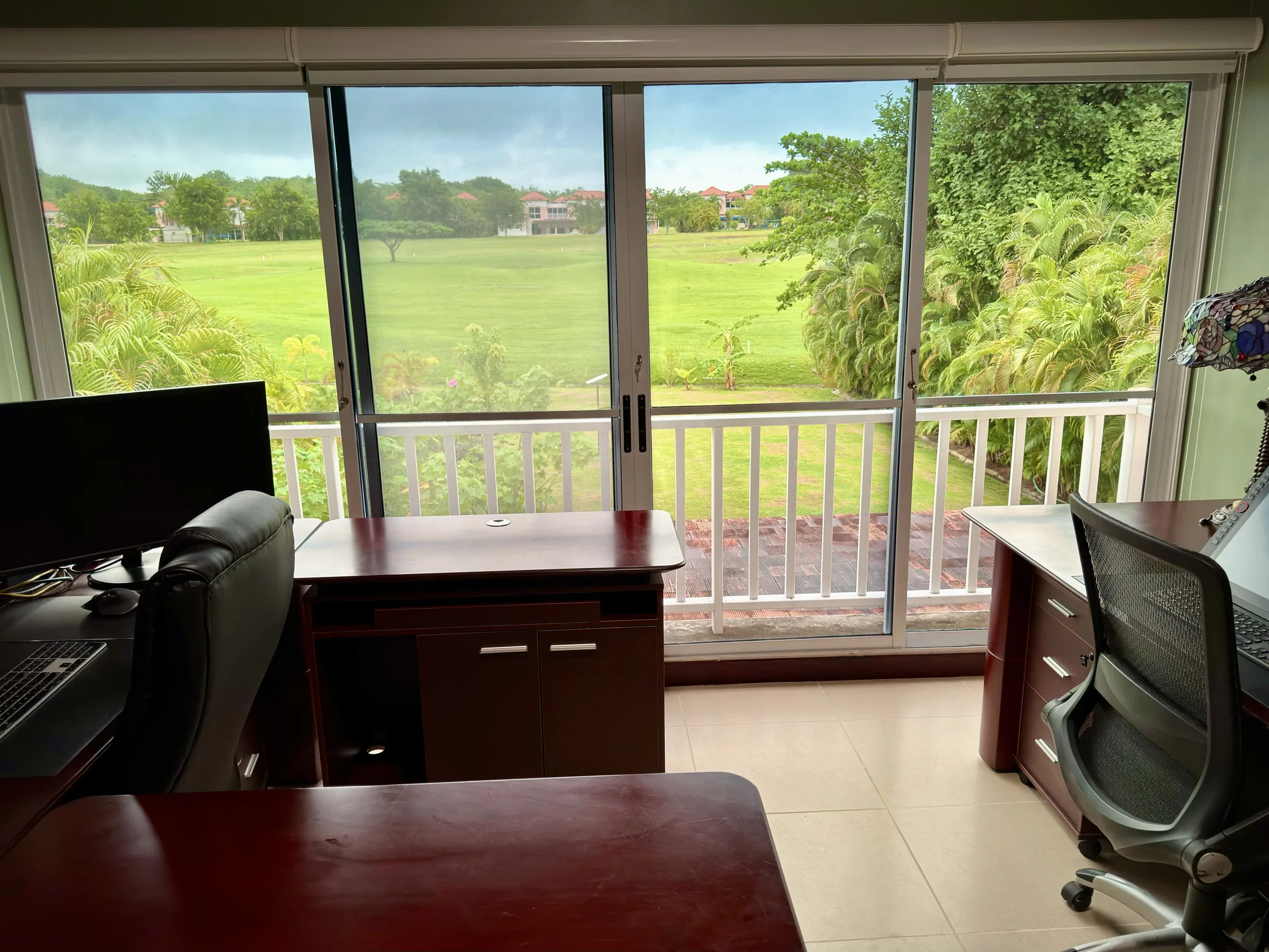Office windows overlooking the golf course